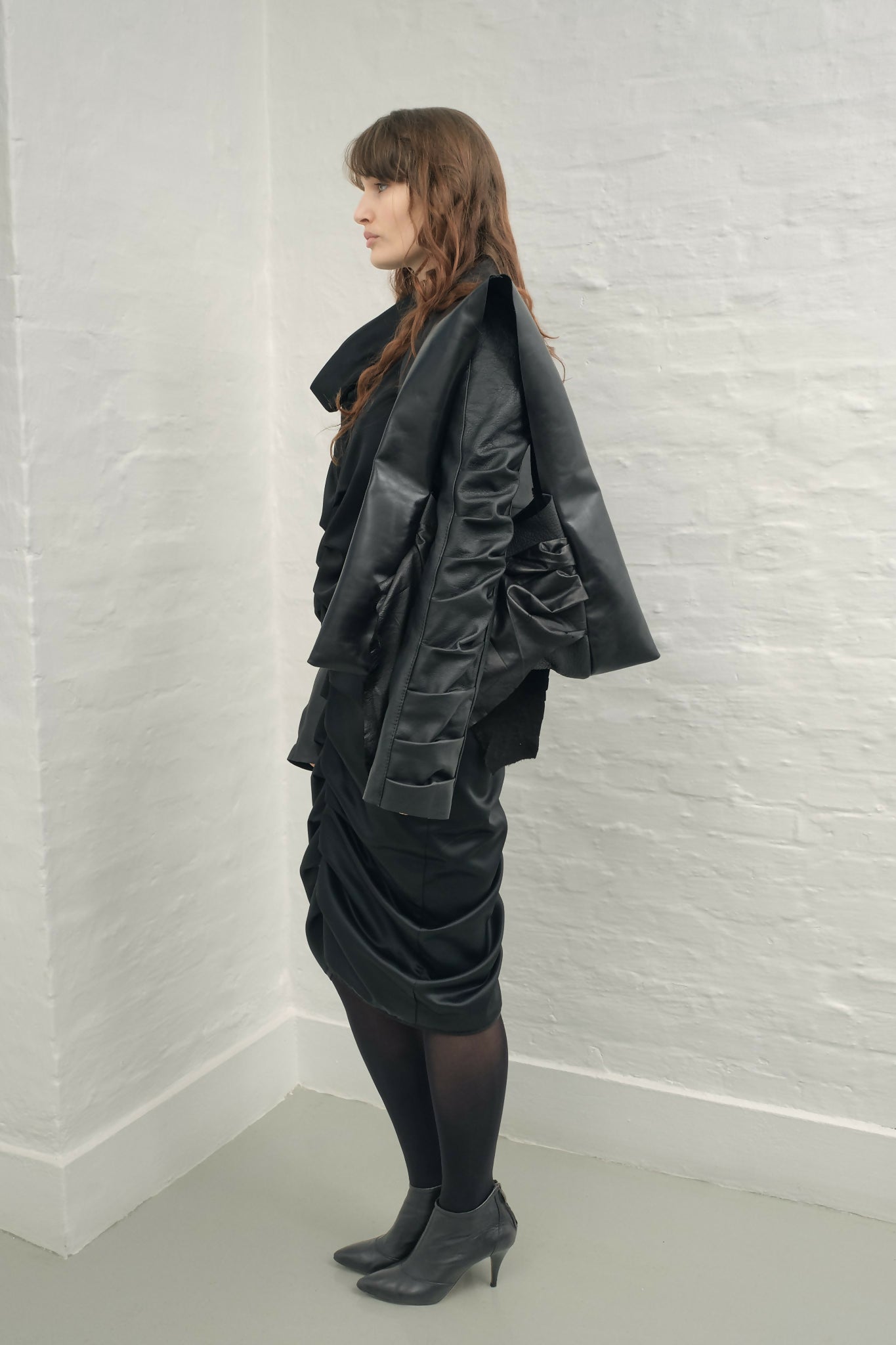 draped raw leather handbag Sahrt
