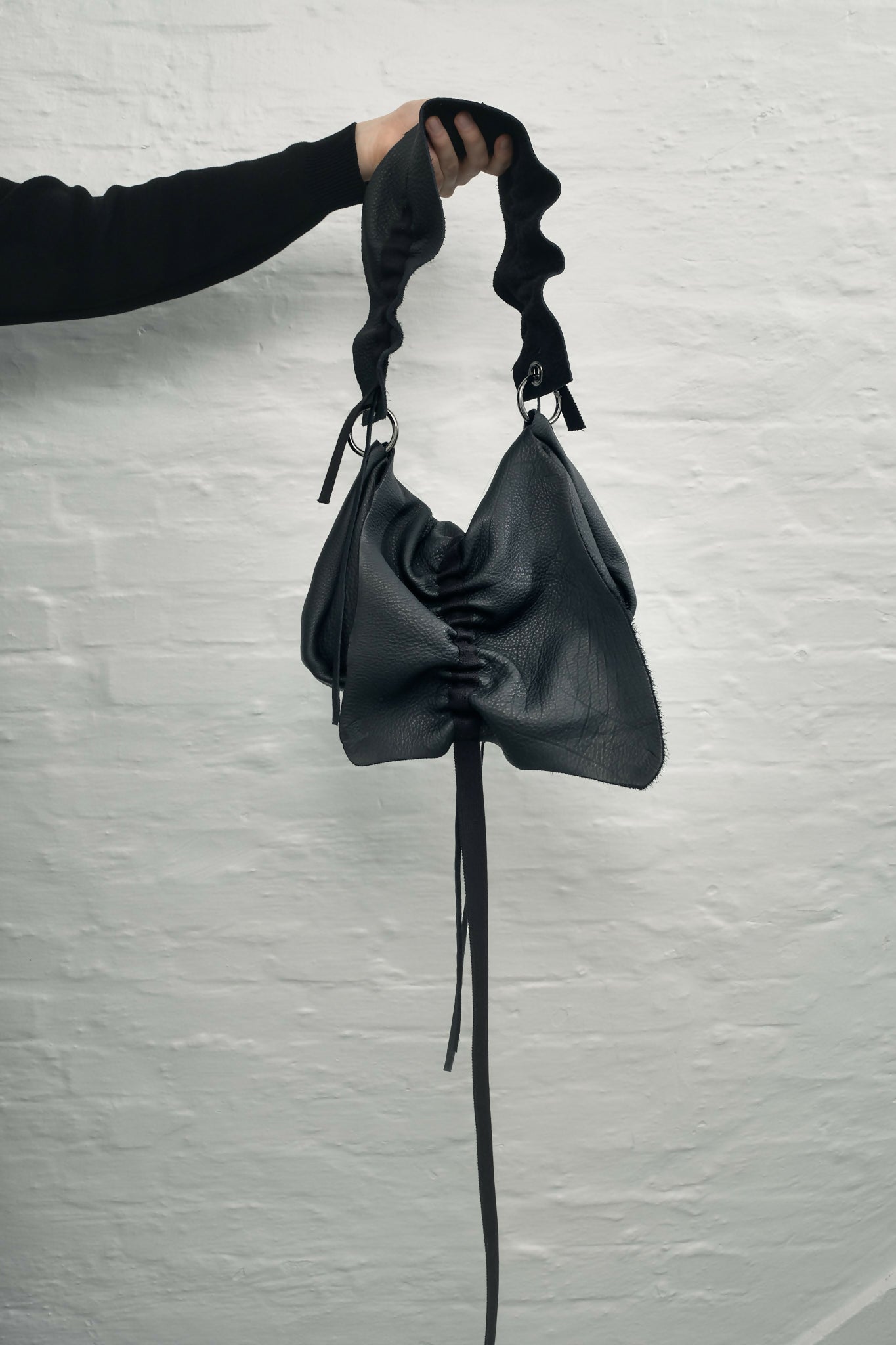 raw leather scrunched handbag Studio Stars