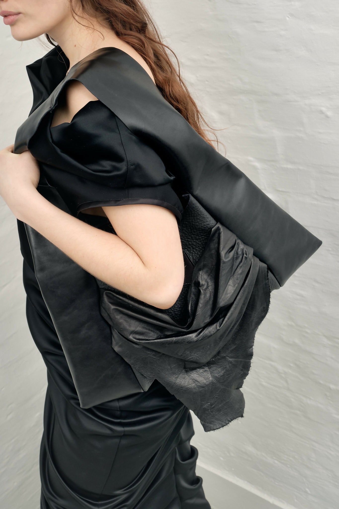 draped raw leather handbag Sahrt